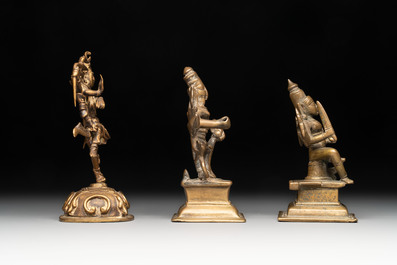 Seven bronze figures of deities and a religious relief plaque, India and Nepal, 18/19th C.