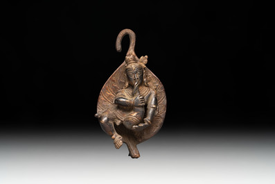 A varied collection of ten Indian bronze objects, 19/20th C.