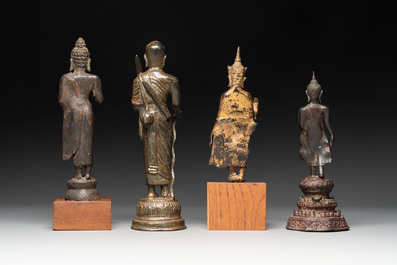 A varied collection of eight bronze Buddha figures, South Asia, 18/19th C.