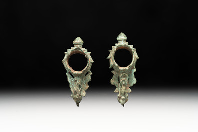 A collection of a bronze sculpture, three palanquin hooks and an elephant-form kendi, Cambodia, 13th C. and earlier