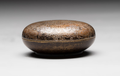 A Chinese gilt and silver inlaid bronze ink paste box and cover and with presentation box, Qianlong mark and possibly of the period