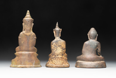 A varied collection of eight bronze Buddha figures, South Asia, 18/19th C.