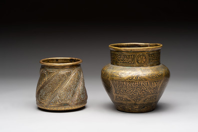 Three 'calligraphic' brass vessels, Qajar, 19/20th C.