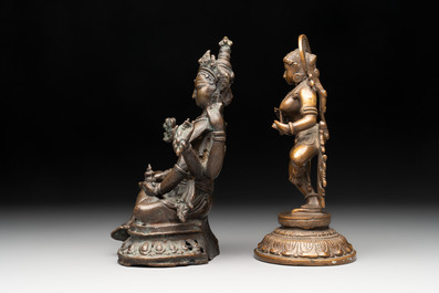 Seven bronze figures of deities and a religious relief plaque, India and Nepal, 18/19th C.