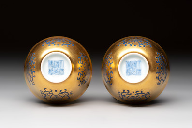 A pair of Chinese gilt-and blue-enamelled 'shou 壽' cups, Daoguang mark and possibly of the period