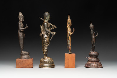 A varied collection of eight bronze Buddha figures, South Asia, 18/19th C.