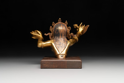 A Sino-Tibetan gilt-bronze Mahakala on stand, a Tibetan Vajradhaka and a Hayagriva, 19/20th C.