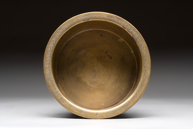 Three 'calligraphic' brass vessels, Qajar, 19/20th C.