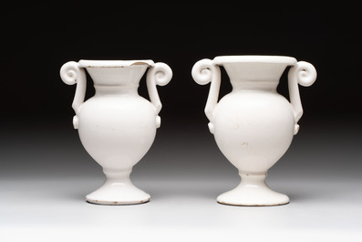 A pair of blue, white and yellow Dutch Delft altar vases, late 17th C.