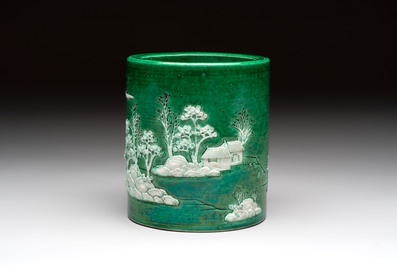 A Chinese verte biscuit 'riverscape' brush pot, artemisia leaf mark, 19th C.