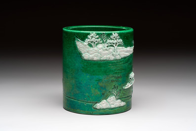A Chinese verte biscuit 'riverscape' brush pot, artemisia leaf mark, 19th C.