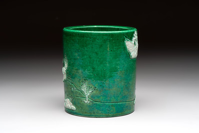 A Chinese verte biscuit 'riverscape' brush pot, artemisia leaf mark, 19th C.