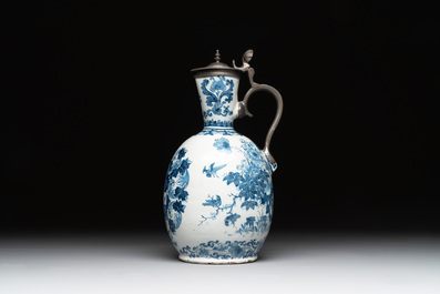 A blue and white Dutch Delft pewter-mounted armorial jug, late 17th C.