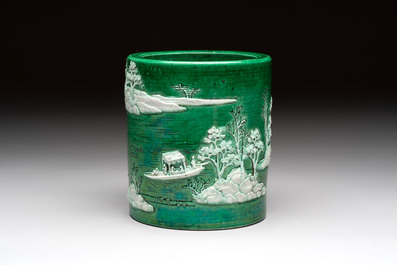 A Chinese verte biscuit 'riverscape' brush pot, artemisia leaf mark, 19th C.