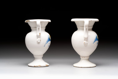 A pair of blue, white and yellow Dutch Delft altar vases, late 17th C.