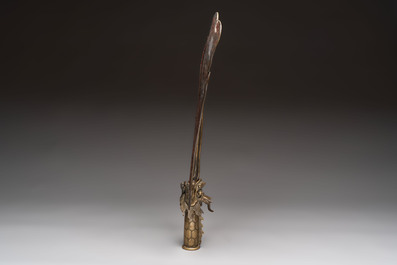 A Chinese brass fan-form temple sign with dragon and phoenix design, Xuantong and Yue Sheng Tang 悅勝堂 mark, dated 1911