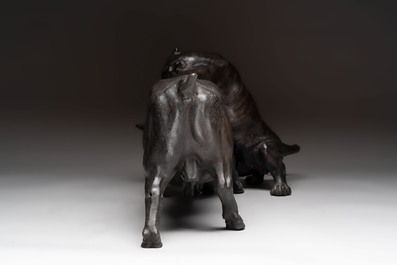 A Japanese bronze okimono of a tiger and a bull, signed Sano Takachika 佐野隆親, Meiji, 19th C.