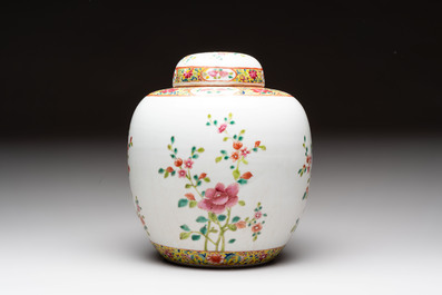 Three Chinese famille rose covered vases, one on a gilt bronze stand, and a covered jar, 19/20th C.