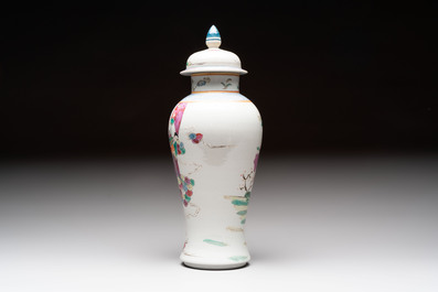 Three Chinese famille rose covered vases, one on a gilt bronze stand, and a covered jar, 19/20th C.