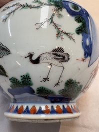 A Chinese wucai vase with narrative design, 19th C.
