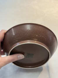 A Chinese aubergine-glazed 'dragon' plate, Jiaqing mark, 19/20th C.