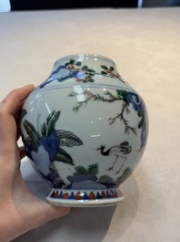 A Chinese wucai vase with narrative design, 19th C.