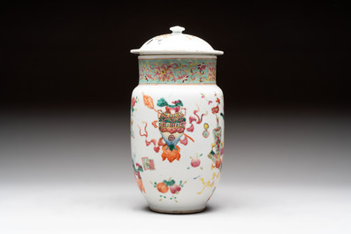 Three Chinese famille rose covered vases, one on a gilt bronze stand, and a covered jar, 19/20th C.