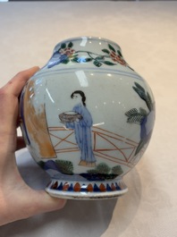 A Chinese wucai vase with narrative design, 19th C.
