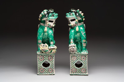 A pair of large Chinese verte biscuit Buddhist lions, 19th C.