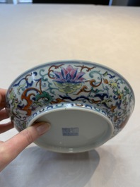 A Chinese doucai plate with floral design, Qianlong mark, 20th C.