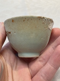 Thirteen Chinese blue and white 'Hatcher Cargo' cups and three celadon-glazed cups, Transitional period