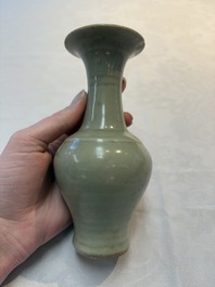 A pair of white-glazed oil lamps, a Longquan celadon vase and Yaozhou celadon box and cover, Ming/Qing