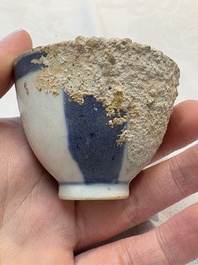 Thirteen Chinese blue and white 'Hatcher Cargo' cups and three celadon-glazed cups, Transitional period