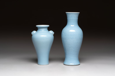 Two Chinese claire-de-lune vases, one with a wooden stand, Kangxi and Yongzheng mark, 19th C.