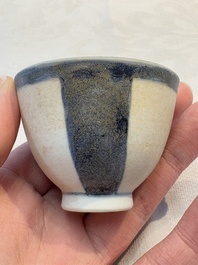 Thirteen Chinese blue and white 'Hatcher Cargo' cups and three celadon-glazed cups, Transitional period