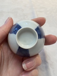 Thirteen Chinese blue and white 'Hatcher Cargo' cups and three celadon-glazed cups, Transitional period