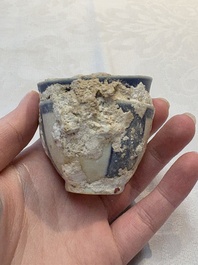 Thirteen Chinese blue and white 'Hatcher Cargo' cups and three celadon-glazed cups, Transitional period