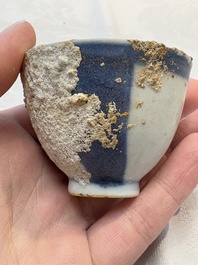 Thirteen Chinese blue and white 'Hatcher Cargo' cups and three celadon-glazed cups, Transitional period