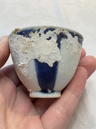 Thirteen Chinese blue and white 'Hatcher Cargo' cups and three celadon-glazed cups, Transitional period