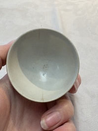 Thirteen Chinese blue and white 'Hatcher Cargo' cups and three celadon-glazed cups, Transitional period
