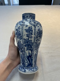 A Chinese blue and white octagonal vase and a plate with floral design, Kangxi