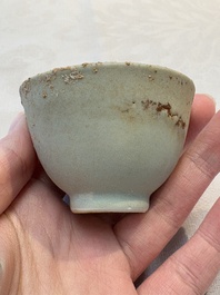 Thirteen Chinese blue and white 'Hatcher Cargo' cups and three celadon-glazed cups, Transitional period
