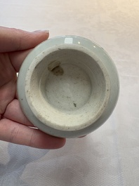 A pair of white-glazed oil lamps, a Longquan celadon vase and Yaozhou celadon box and cover, Ming/Qing