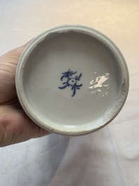 A Chinese blue and white octagonal vase and a plate with floral design, Kangxi