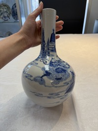 A Chinese blue and white bottle vase with narrative design, Qianlong mark, 19th C.