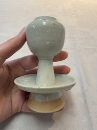 A pair of white-glazed oil lamps, a Longquan celadon vase and Yaozhou celadon box and cover, Ming/Qing