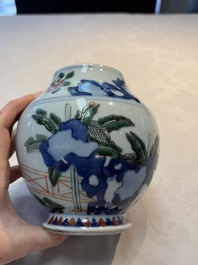 A Chinese wucai vase with narrative design, 19th C.