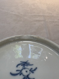 A Chinese blue and white octagonal vase and a plate with floral design, Kangxi