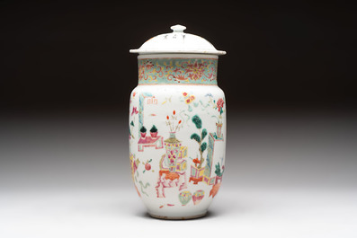 Three Chinese famille rose covered vases, one on a gilt bronze stand, and a covered jar, 19/20th C.