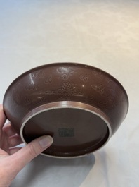 A Chinese aubergine-glazed 'dragon' plate, Jiaqing mark, 19/20th C.